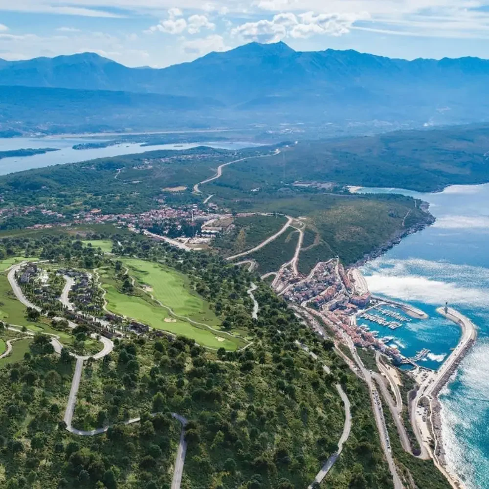 Aerial view of The Peaks and the golf course above the bay